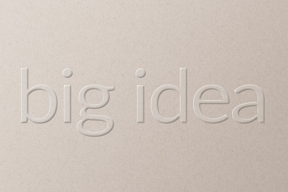 Big idea embossed text on white paper background