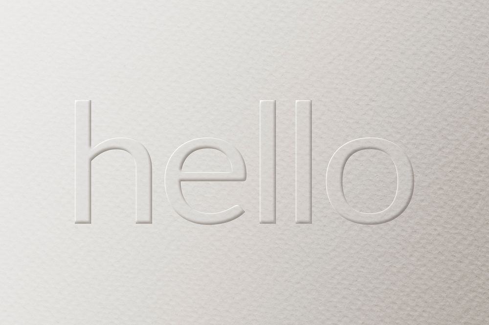 Hello embossed typography white paper background