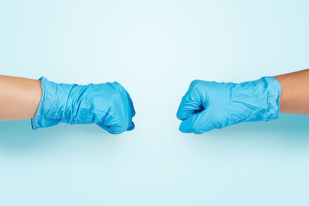 Medical staff bumping, blue background psd