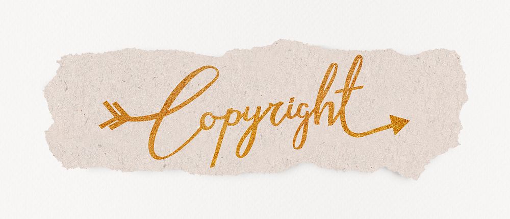 Copyright word, gold glittery calligraphy on torn paper