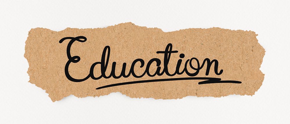 Education word, black calligraphy on ripped kraft paper