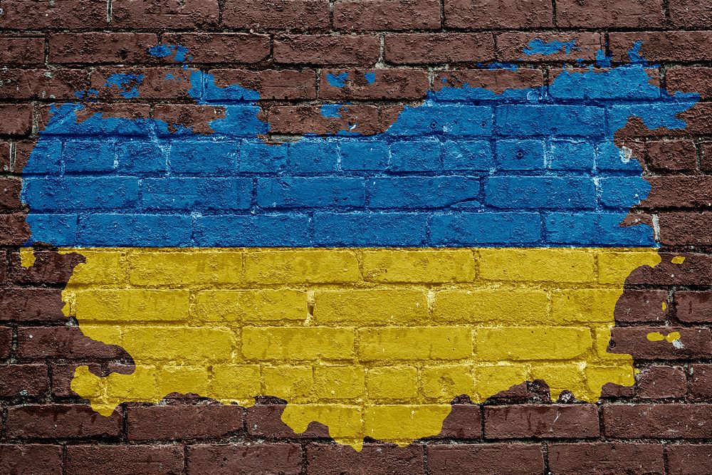 Ukrainian flag, brown brick wall texture design