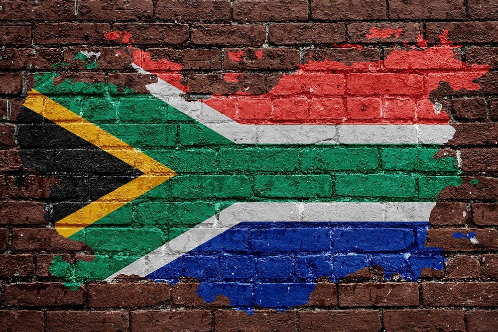 South Africa's flag, brown brick wall texture design
