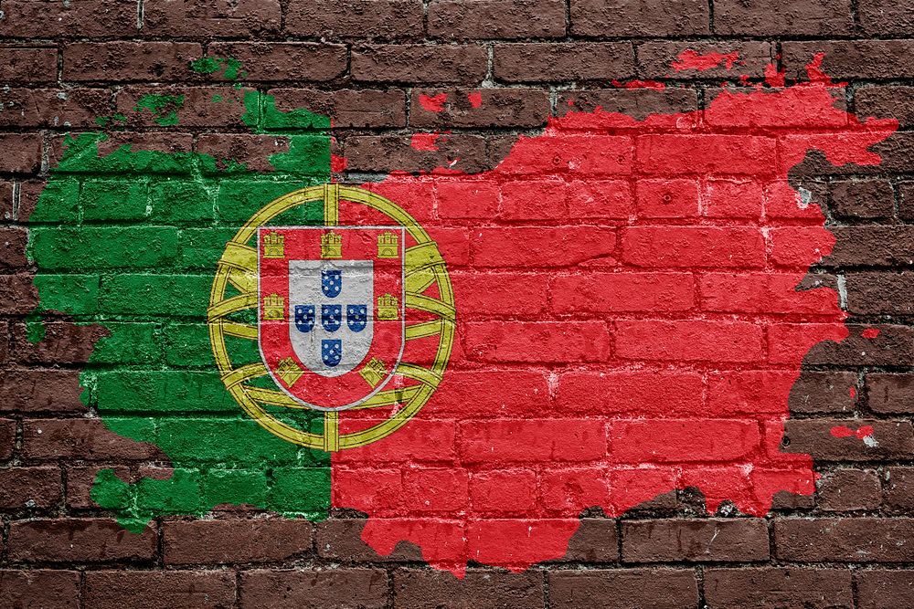 Portugal's flag, brown brick wall texture design