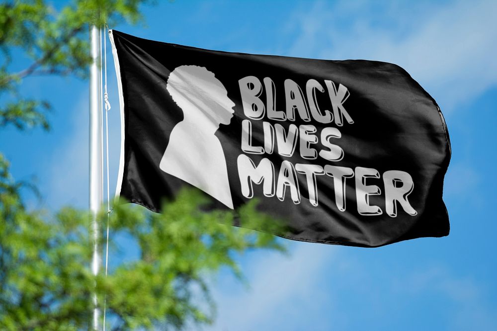 Black lives matter word flag, blue sky, typography