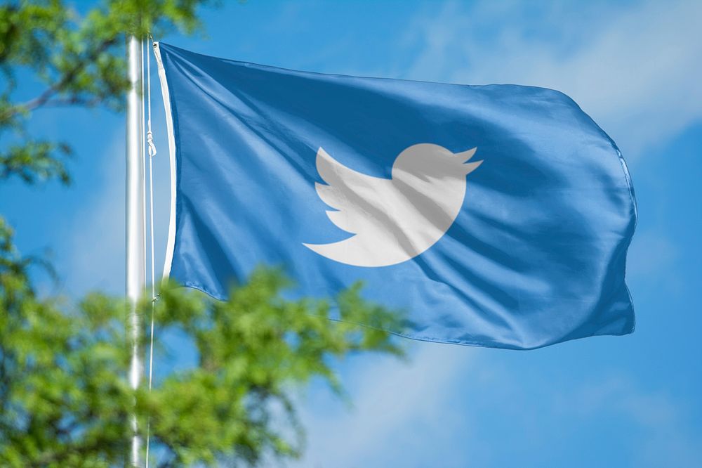 Twitter icon for social media on flag. 26 MAY 2022 - BANGKOK, THAILAND
