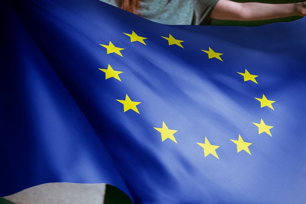 Person holding European union flag background, national symbol