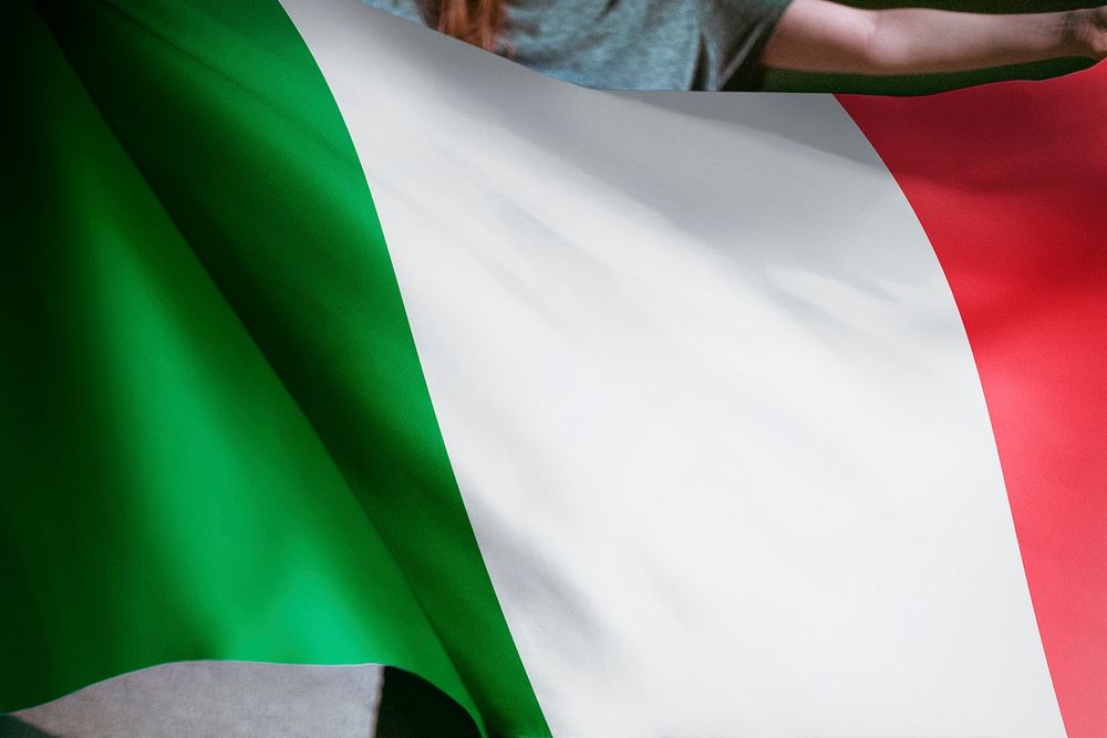 Person holding Italian flag background, national symbol