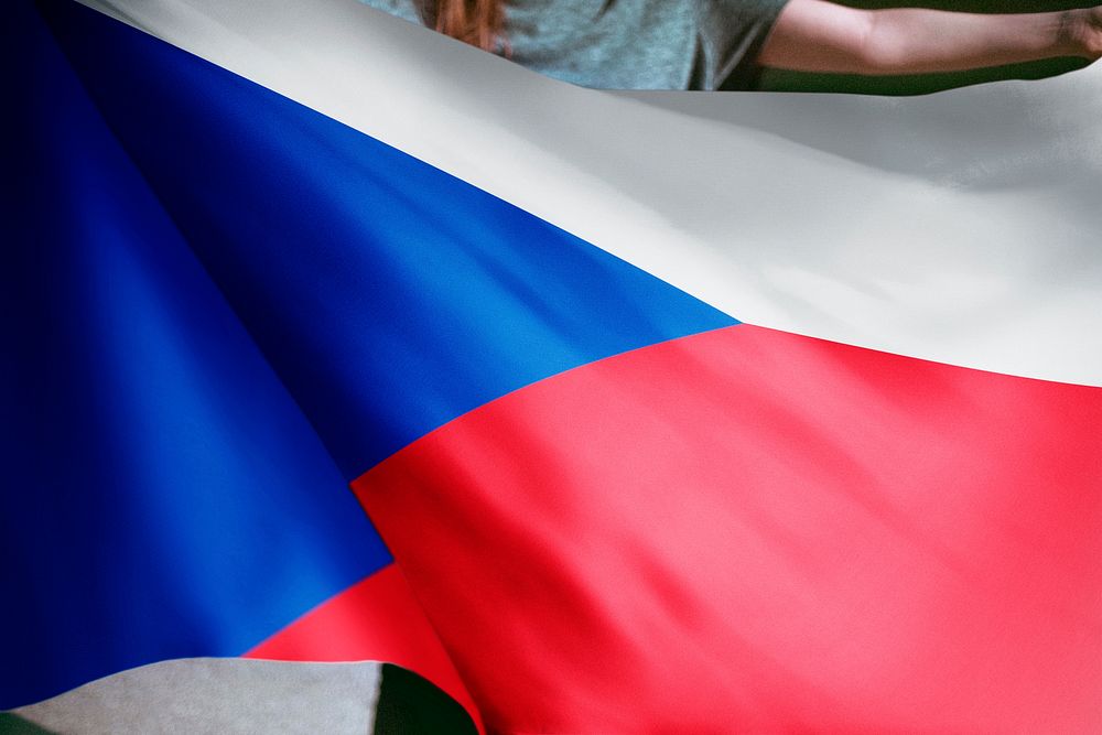 Person holding Czechia flag background, national symbol