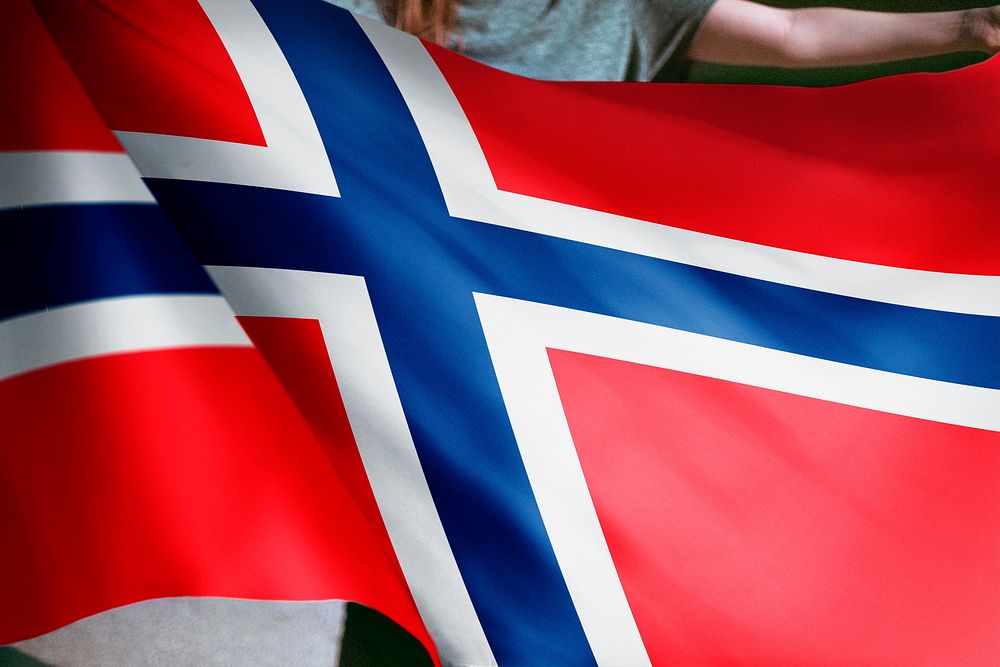 Person holding Iceland flag background, national symbol