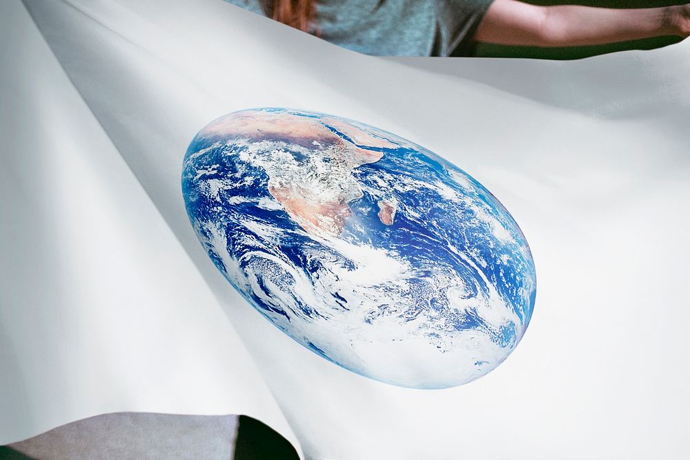 Person holding white flag, Earth sticker 