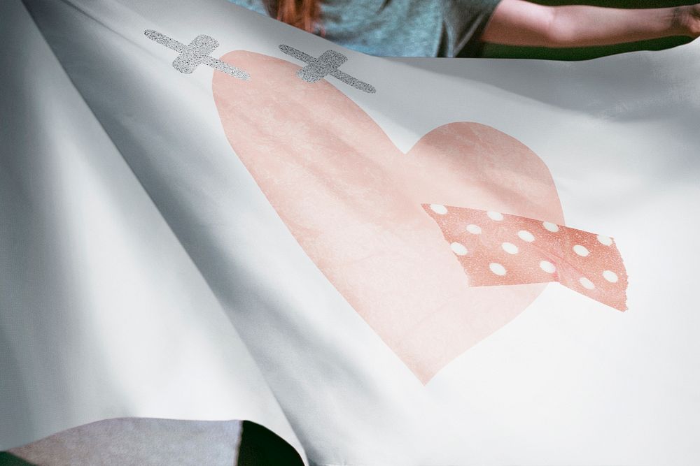 Person holding heart illustration flag background