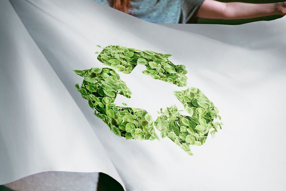 Person holding recycle tree flag, Sustainability background