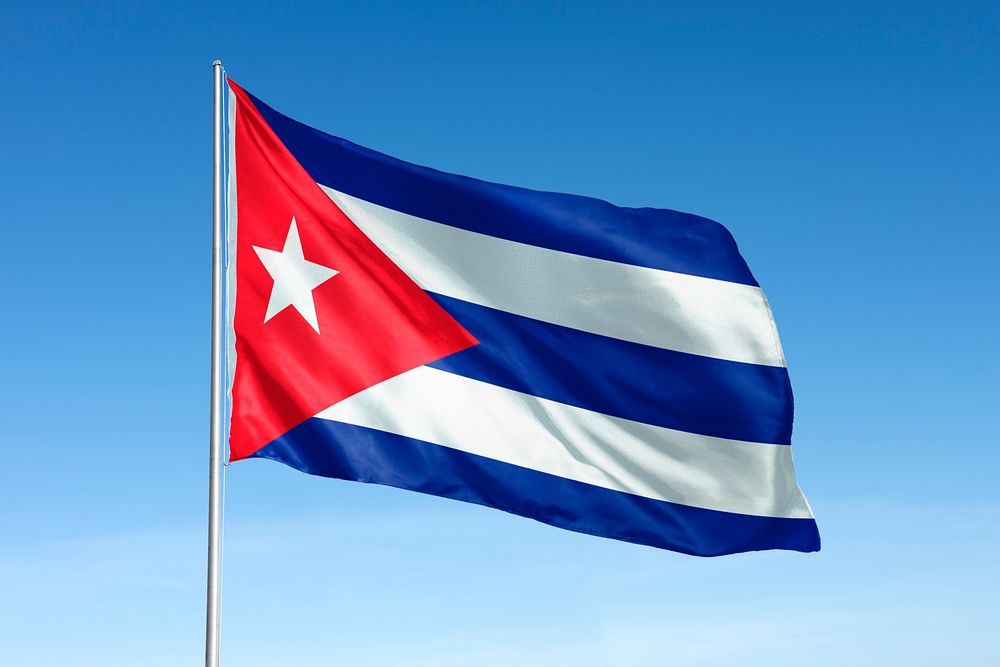 Waving Cuban flag, national symbol, blue sky