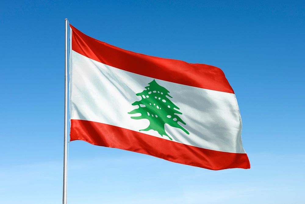 Waving Lebanon flag, national symbol, blue sky