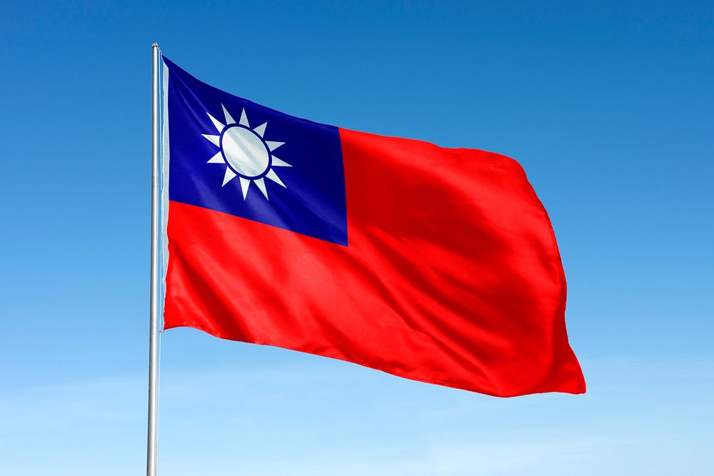 Waving Taiwan flag, national symbol, blue sky