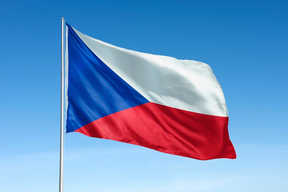 Waving Czechia flag, national symbol, blue sky