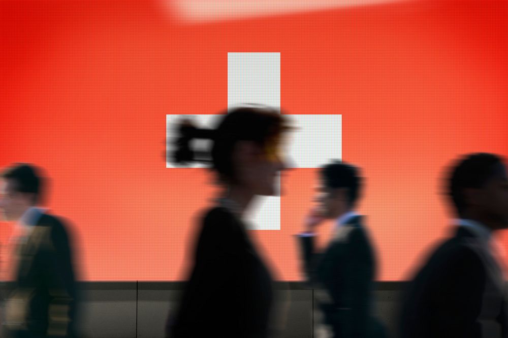 Switzerland flag led screen, silhouette people