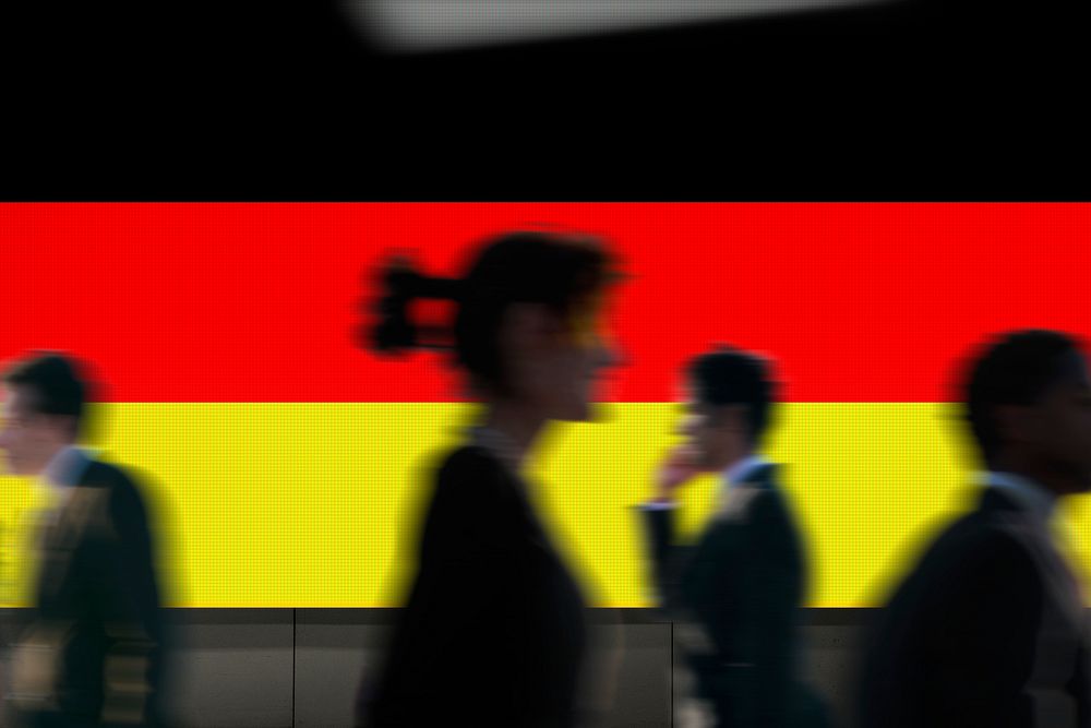 Germany flag led screen, silhouette people