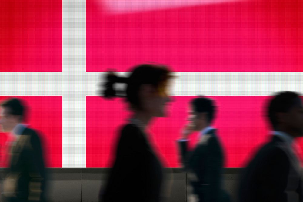 Denmark flag led screen, silhouette people