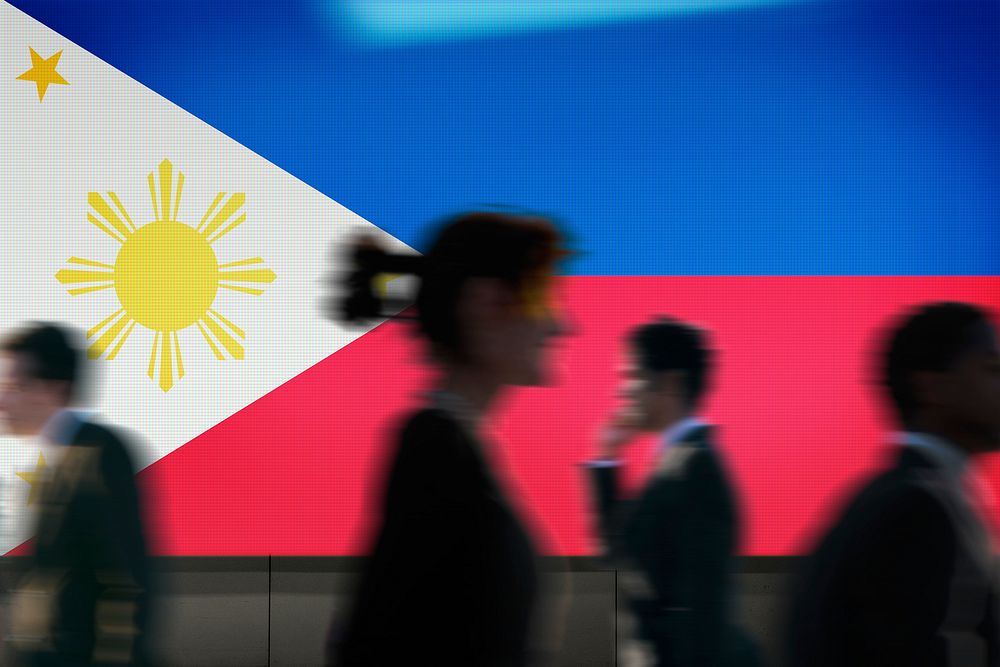 Philippines flag led screen, silhouette people