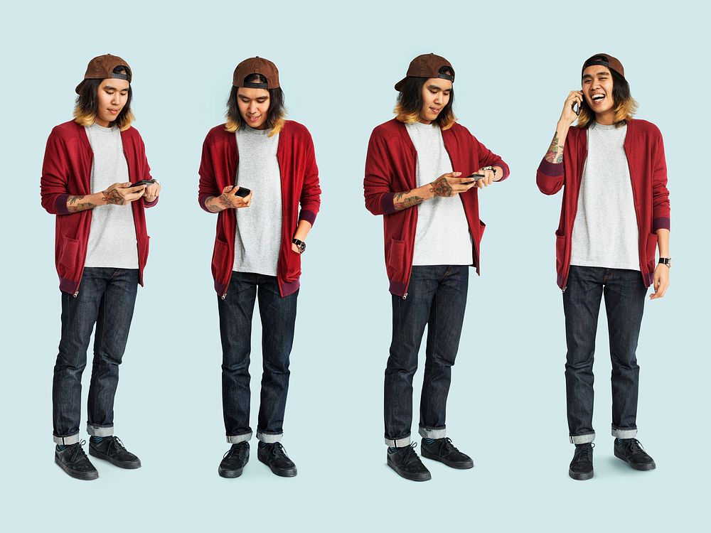 Young Man Using Mobile Devices Studio Isolated