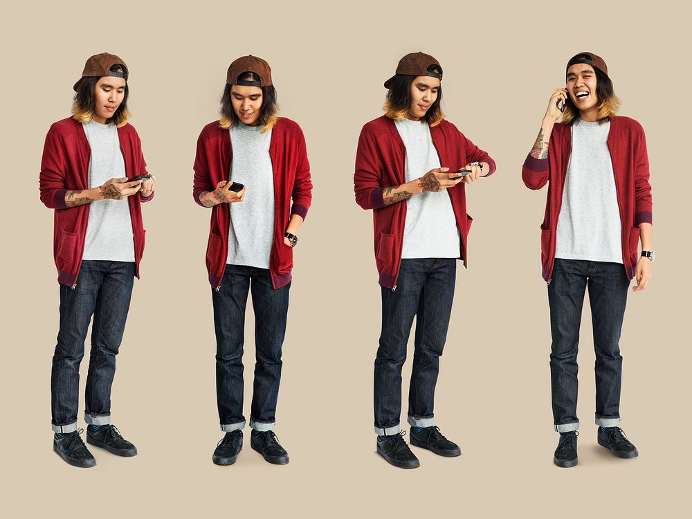 Young Man Using Mobile Devices Studio Isolated