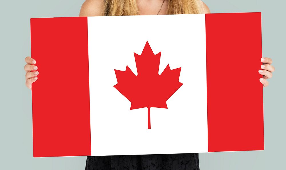 Woman Hands Hold Canada Flag Patriotism