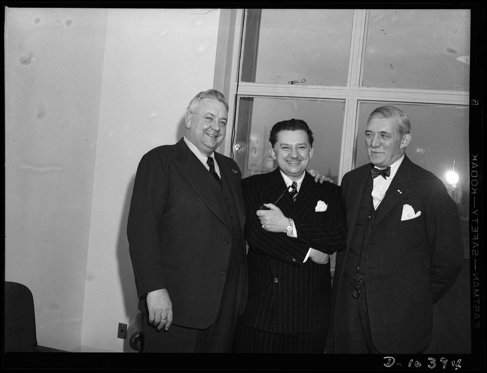 Washington, D.C. Opera singer Lauritz Melchior (left), and Gene (i.e., Jean) Hersholt, movie actor (center), visiting…