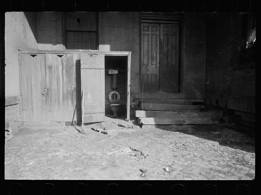 Tier of outhouses by the old schoolhouse, Hamilton County, Ohio. Sourced from the Library of Congress.