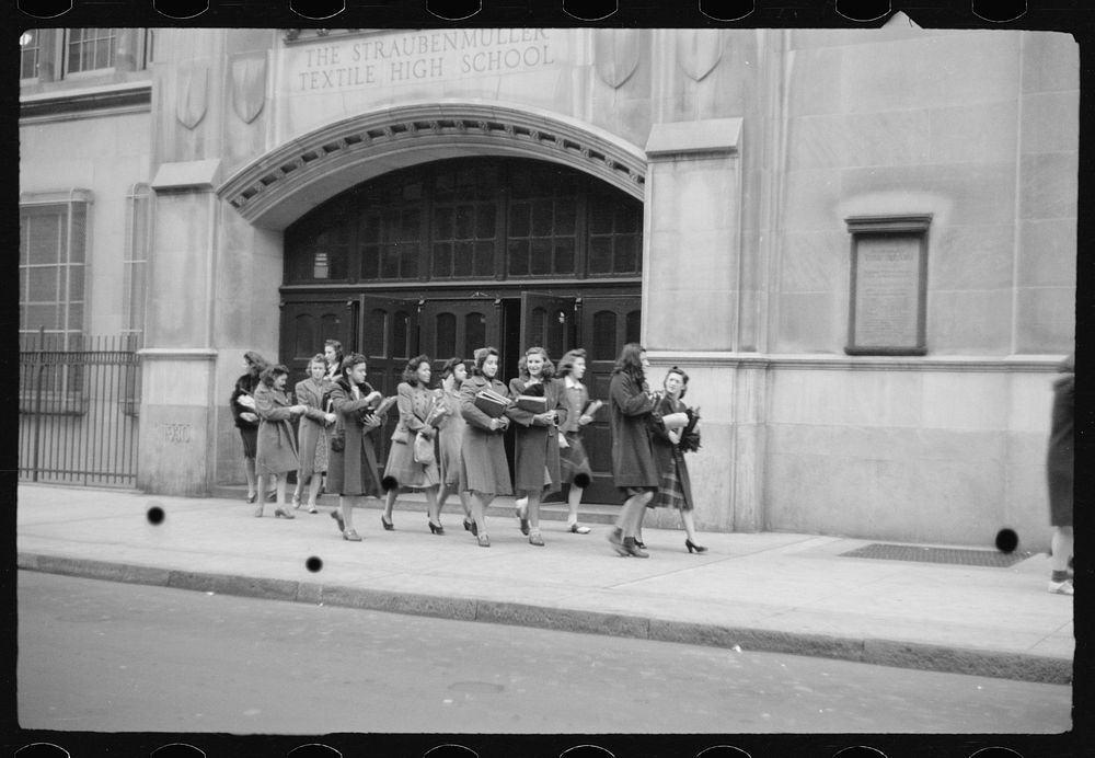 [Schoolgirls walking along street in front of Straubenmuller Textile High School, New York, New York]. Sourced from the…