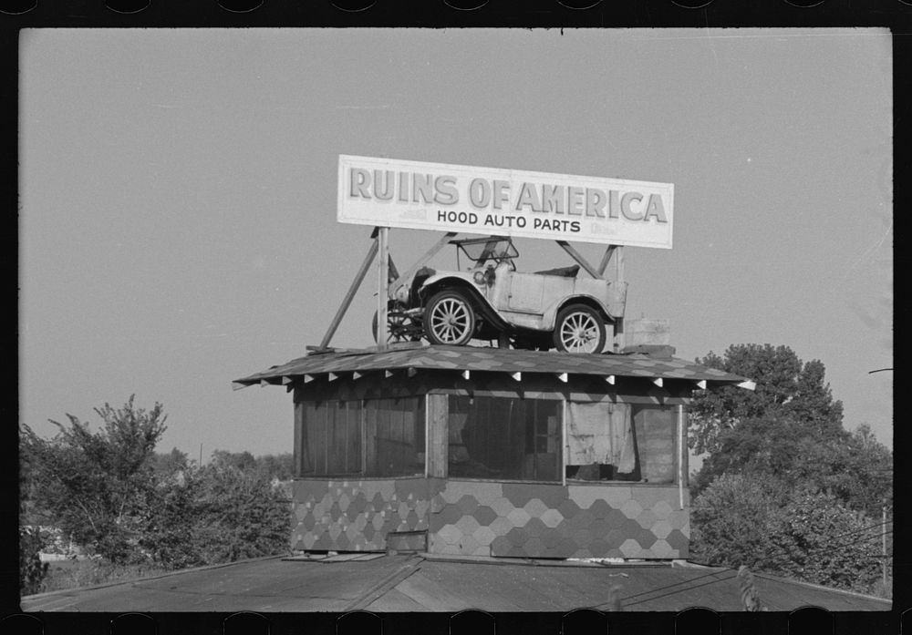 [Untitled photo, possibly related to: Auto graveyward advertisement in Arkansas]. Sourced from the Library of Congress.