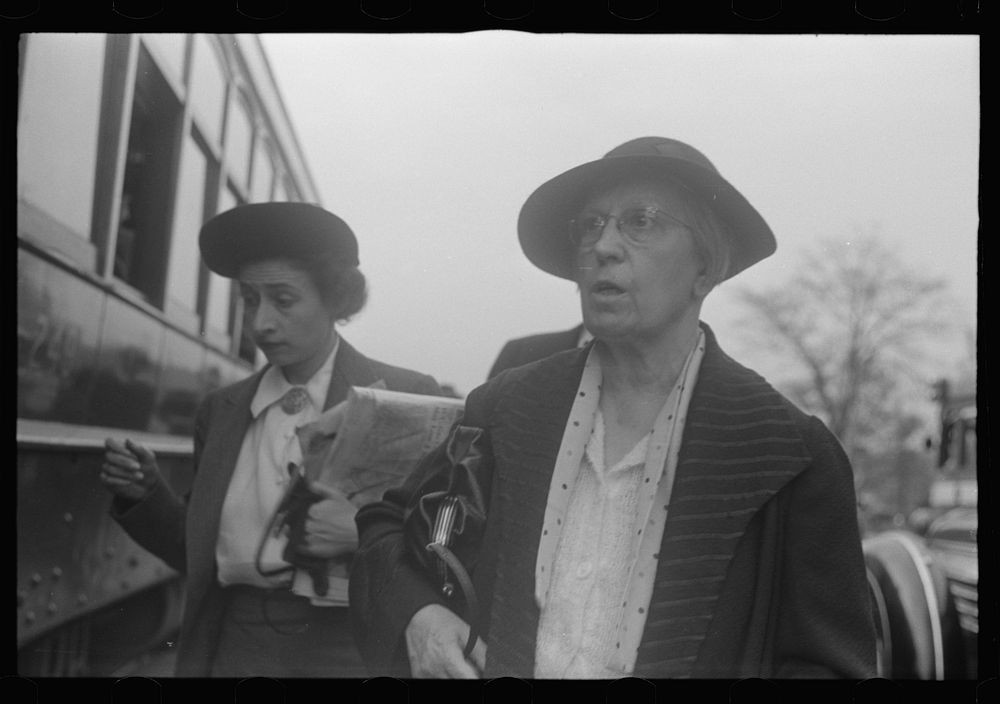 Washington, D.C. Two women, probably government clerks, getting ready to board a street car. Sourced from the Library of…