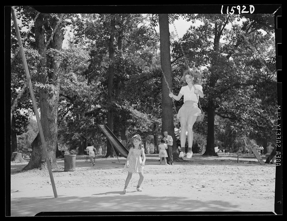 Washington, D.C. Girl in a swing in Rock Creek Park. Sourced from the Library of Congress.
