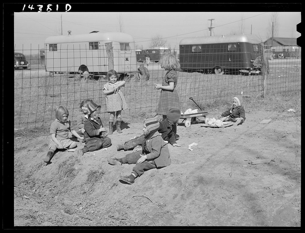 Children of defense workers playing in "their backyards." Trailer camp, Mount Vernon Highway, Alexandria, Virginia. Sourced…
