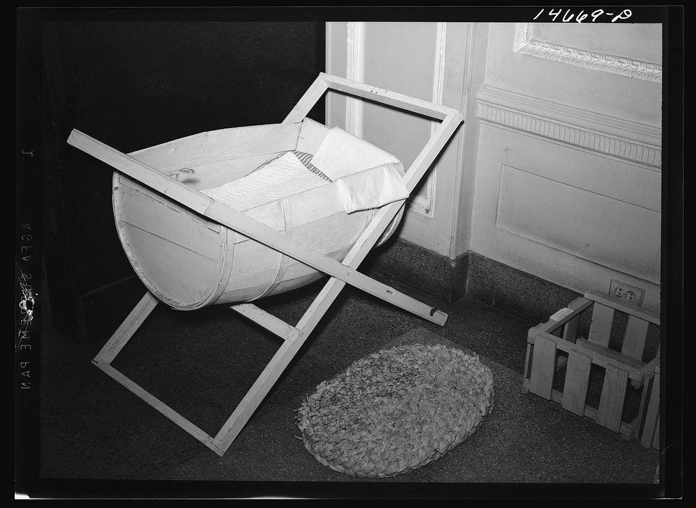Crib made from scrap materials, probably on a Farm Security Administration project. Sourced from the Library of Congress.