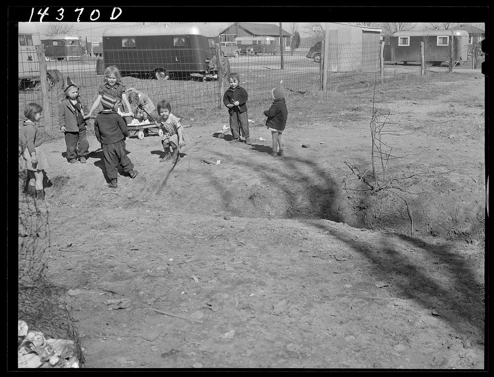 [Untitled photo, possibly related to: Children of defense workers playing in "their backyards." Trailer camp, Mount Vernon…