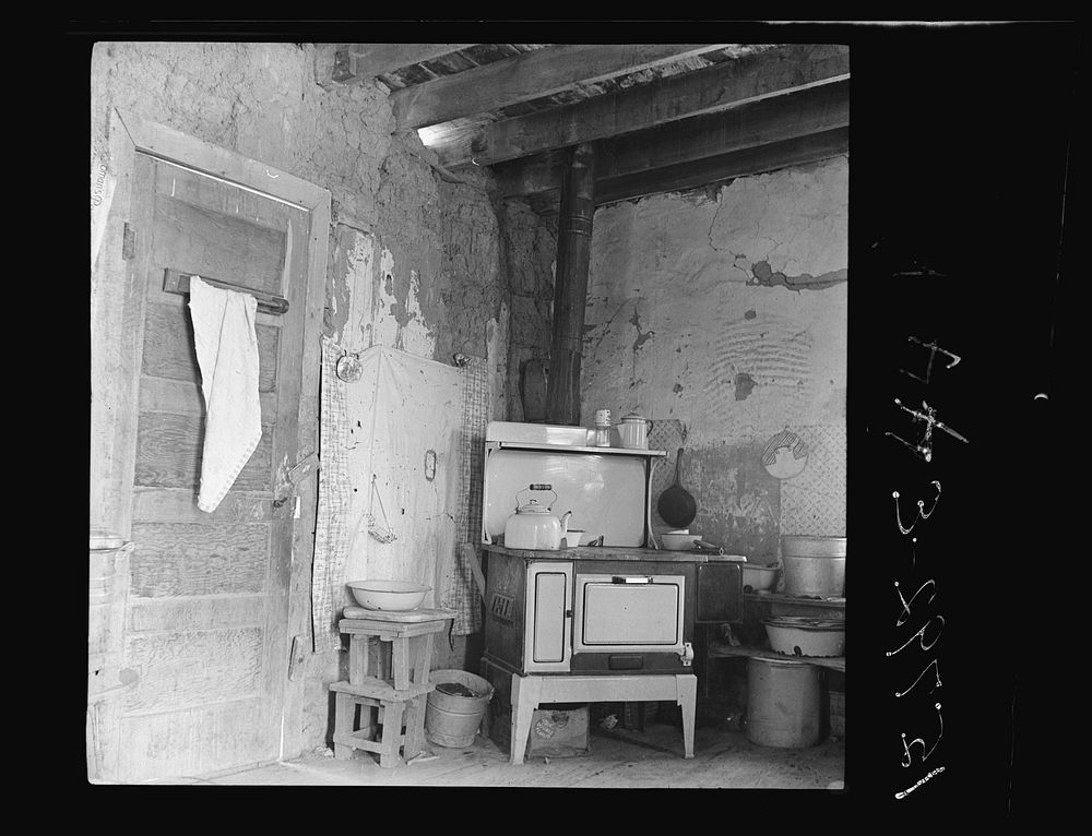 Kitchen with stove bought last winter from Denver salesman. Great Western Sugar Company's beet sugar workers colony at…