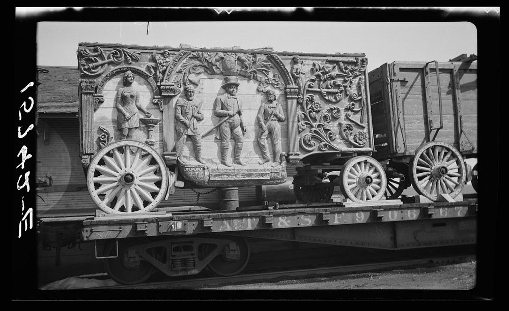 Circus wagon, Texas. Carving shows Indians and white man. From circus of Miller Brothers. "101" Ranch. Sourced from the…
