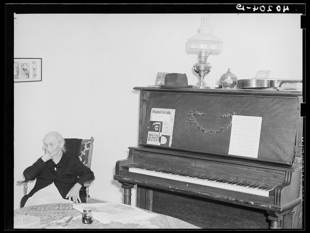 Barto, Berks county, Pennsylvania. Mrs. Springer, Mrs. Evan's grandmother, in the living room on the farm of Thomas G.…