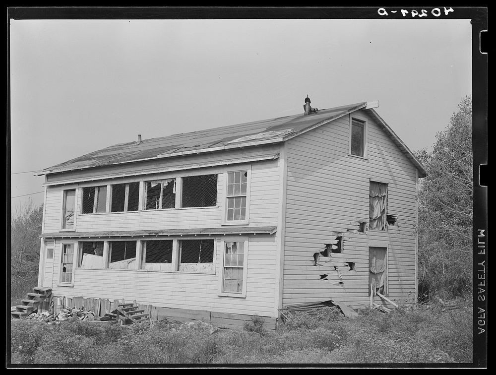 New England hurricane. Chicken house damaged by the debris from a second chicken house which was demolished between…