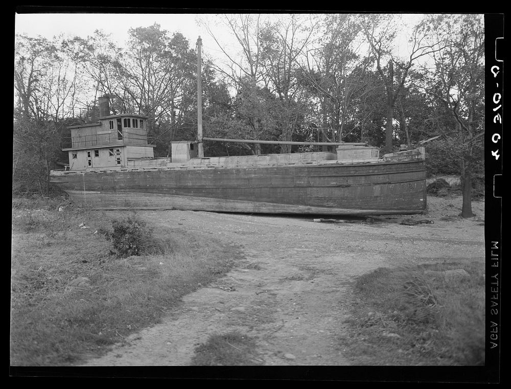 New England hurricane. Cargo boat on bay shore near Providence, Rhode Island. Sourced from the Library of Congress.