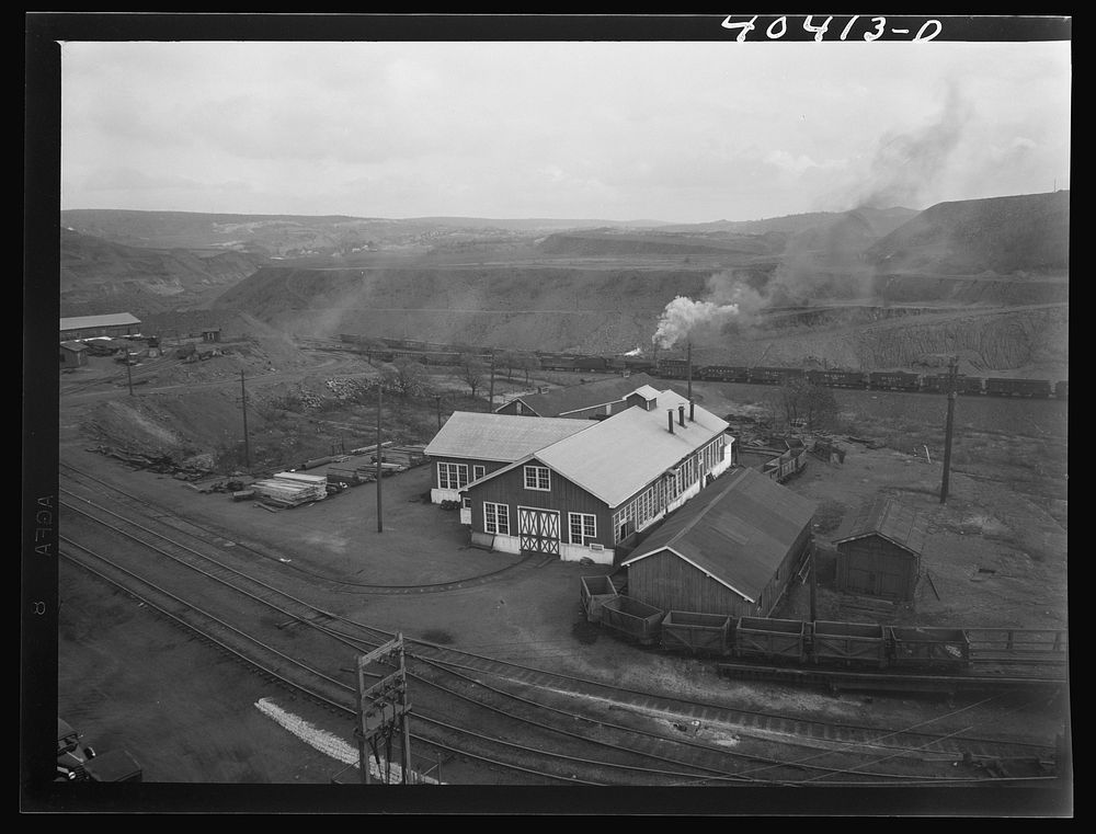 Shenandoah, Pennsylvania. A view of buildings, coal cars and tracks at Maple Hill mine, seen from shaft tower. Sourced from…