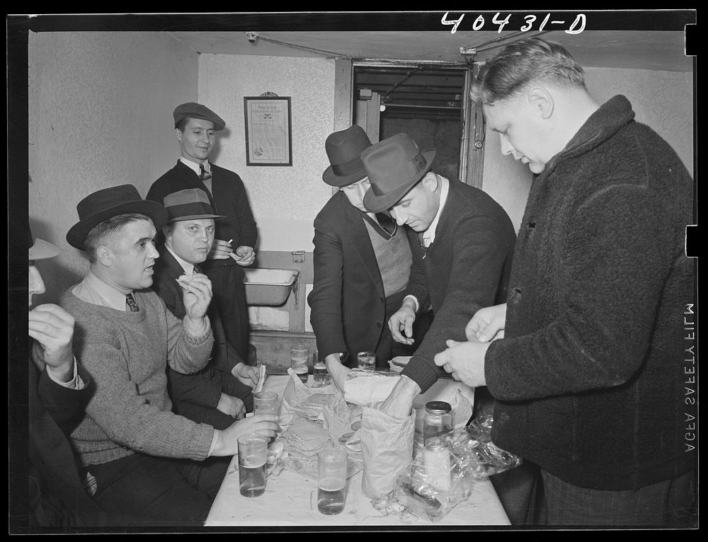 Shenandoah, Pennsylvania. Beer party in Joe Gladski's cellar. Mr. Gladski is in the right foreground. Sourced from the…