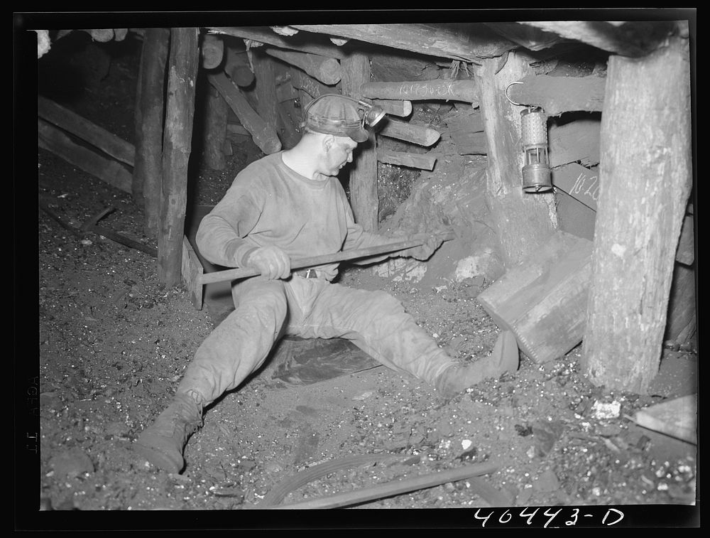 Shenandoah, Pennsylvania. Joe Gladski, miner, setting dynamite in tunnel twenty-five in Maple Hill mine. Sourced from the…