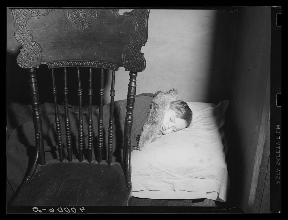 New York, New York.  A boy sleeping at his home on East 62nd (or 63rd) Street. Sourced from the Library of Congress.