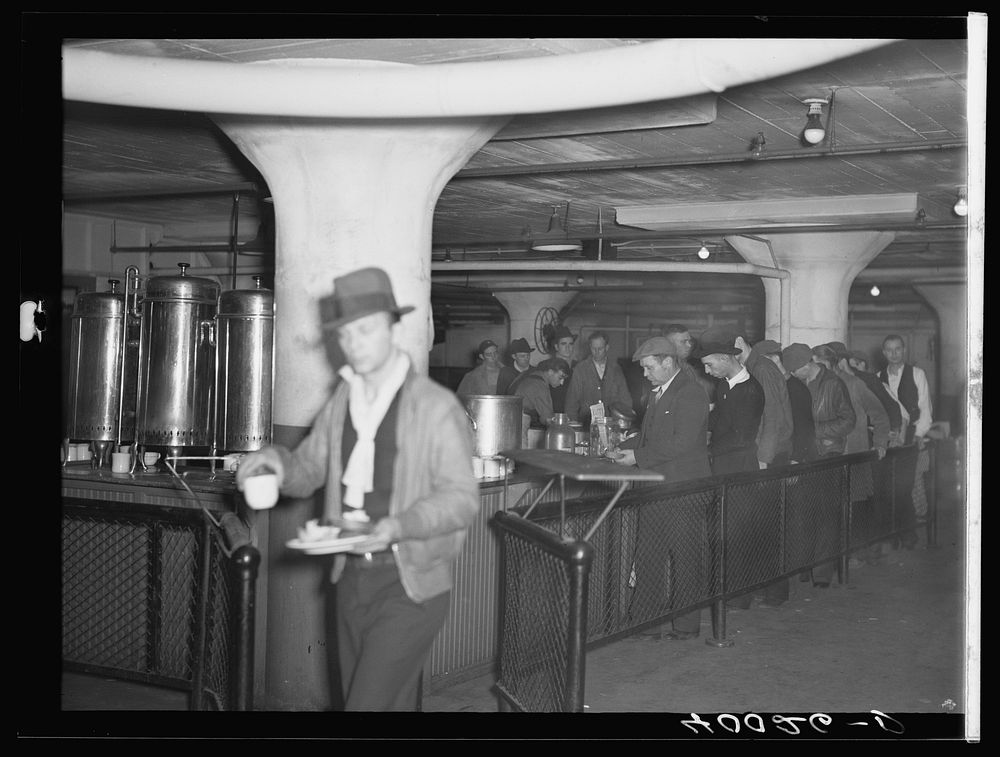 Strikers in the cafeteria in the Fisher body plant number three. Flint, Michigan. Sourced from the Library of Congress.