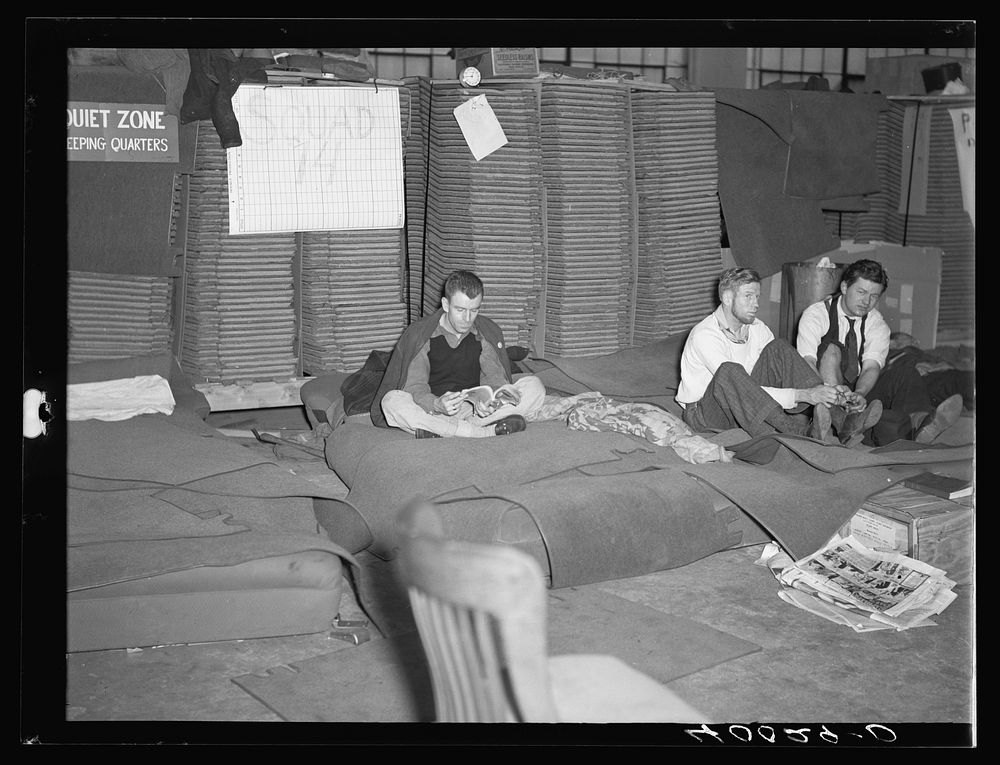 Sleeping quarters for striking autoworkers in Fisher body plant, factory number three. Michigan. Sourced from the Library of…