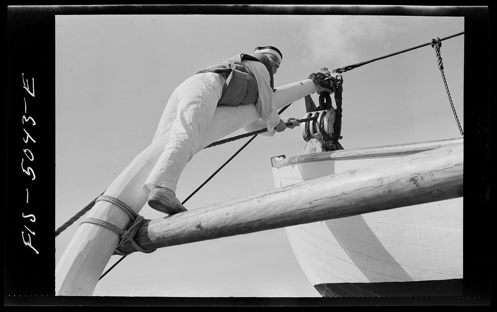 U.S. Naval Academy, Annapolis, Maryland. Midshipman lowering a boat from the davits. Sourced from the Library of Congress.
