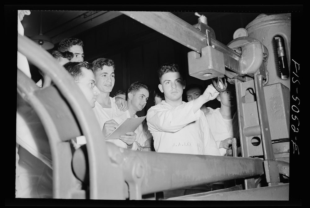 [Untitled photo, possibly related to: U.S. Naval Academy, Annapolis, Maryland. Studying an engine]. Sourced from the Library…